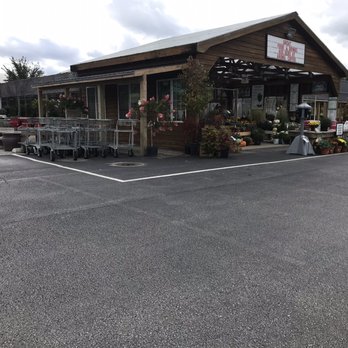 The Green Thumbers - the outside of a grocery store - Nurseries & Gardening Near Me - Davenport, Iowa