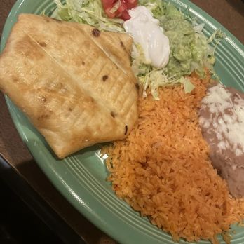 La Fiesta Mexican Restaurant - 13. Chimichanga (cheese sauce on side) - Mexican Near Me - Fairburn, Georgia La Fiesta Mexican Restaurant - 13. Chimichanga (cheese sauce on side) - Mexican Near Me - Fairburn, Georgia