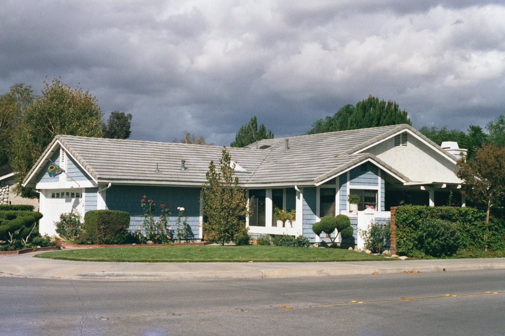 Slide of Valencia Roofing Company