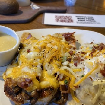 Outback Steakhouse - Alice Springs Chicken entree.  With honey mustard dipping sauce and loaded mashed potatoes. - Steakhouses Near Me - Highlands Ranch, Colorado