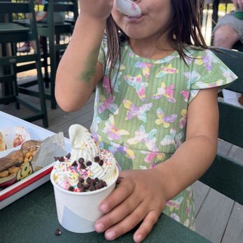 Foothill Market - kid enjoying soft serve vanilla ice cream with sprinkles and chocolate chips - Delis Near Me - Genoa, Nevada