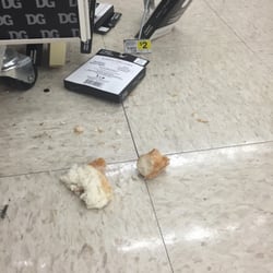 Dollar General - Yes that is a donut in the floor!!!! Pretty gross!