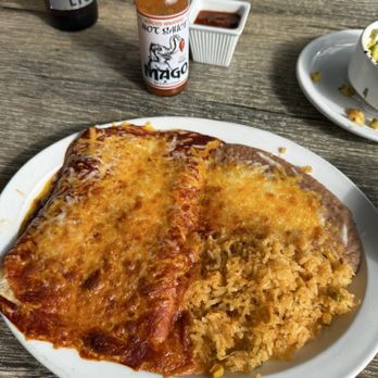 Coyote Grill - Cheese enchiladas with pinto beans and rice. - Mexican Near Me - Laguna Beach, California Coyote Grill - Cheese enchiladas with pinto beans and rice. - Mexican Near Me - Laguna Beach, California