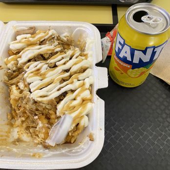 Symphony Mediterranean Grill - Loaded fries and a pineapple Fanta. It's a miracle I had the presence of mind to stop and take a photo. - Halal Near Me - Florence, Kentucky