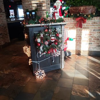 Cheddar's Scratch Kitchen - Host stand decorated in Christmas decorations - American Near Me - Avon, Indiana Cheddar's Scratch Kitchen - Host stand decorated in Christmas decorations - American Near Me - Avon, Indiana