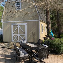 Ark Home Repair - Barn Storage shed- replaced walls, doors, prepped and repainted.