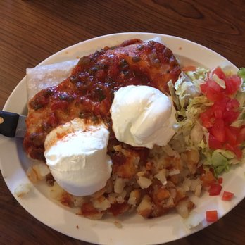 Harlow's Cafe - Chorizo Burrito with sour cream on top and freshly made hash browns on the side. - Burgers Near Me - Tempe, Arizona Harlow's Cafe - Chorizo Burrito with sour cream on top and freshly made hash browns on the side. - Burgers Near Me - Tempe, Arizona