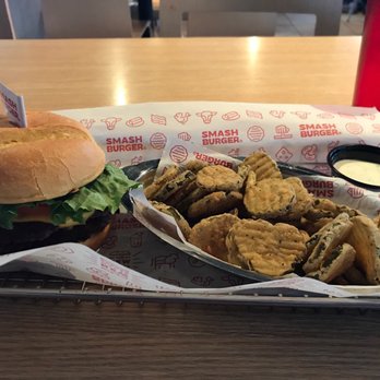 Smashburger - Classic triple double burger with a side of crispy pickles - Burgers Near Me - Northglenn, Colorado Smashburger - Classic triple double burger with a side of crispy pickles - Burgers Near Me - Northglenn, Colorado