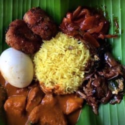 Rice and curry on banana leaf. It doesn't get better than this.