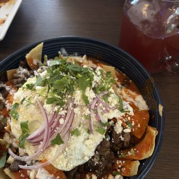Alebrijes Cafe & Grill - Chilaquiles Rojo w Asada  Jamaica & sandía mixed agua fresca - Breakfast & Brunch Near Me - Litchfield Park, Arizona