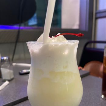 Captain John's - Piña colada... - Seafood Near Me - Lowell, Massachusetts