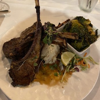 Papi Cuisine - Honey jerk lamb chops, mash potatoes and Brussels sprouts. - Cocktail Bars Near Me - Baltimore, Maryland