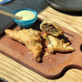 Cabra - Goat Empanadas with huacatay mayo - Peruvian Near Me - Chicago, Illinois Cabra - Goat Empanadas with huacatay mayo - Peruvian Near Me - Chicago, Illinois