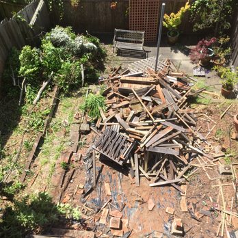 Green Construction Builders - Demolished old deck, fencing and old wood planters. - Landscaping Near Me