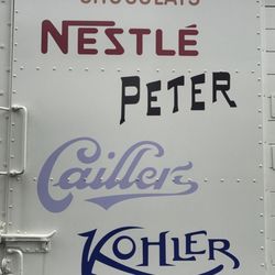 Musée Nest - The chocolate brands on a fake train outside. Note that Nestle owns all of these.