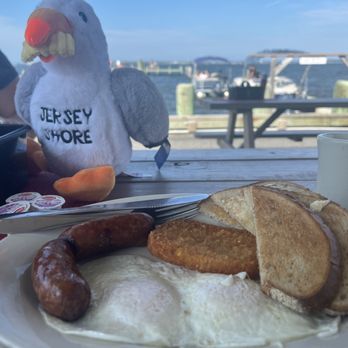 The Dock Outfitters - Basic 2 eggs over easy rye toast hash brown and thick sausage. Excellent every time. - Boating Near Me - Seaside Heights, New Jersey The Dock Outfitters - Basic 2 eggs over easy rye toast hash brown and thick sausage. Excellent every time. - Boating Near Me - Seaside Heights, New Jersey