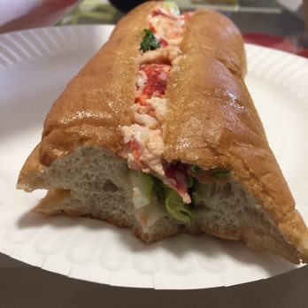 Bella Pizza Pub - Side view of the lobster roll. Practically no lobster and it was not fresh. It was gross and not what you'd expect from Maine. - Pizza Near Me - Old Orchard Beach, Maine