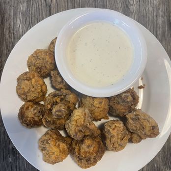 Stones Throw Brewing - a plate of fried food and a bowl of dip - Brewpubs Near Me - Goose Creek, South Carolina Stones Throw Brewing - a plate of fried food and a bowl of dip - Brewpubs Near Me - Goose Creek, South Carolina