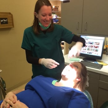 Calliham Dentistry - checking a patient - General Dentistry Near Me - College Station, Texas Calliham Dentistry - checking a patient - General Dentistry Near Me - College Station, Texas