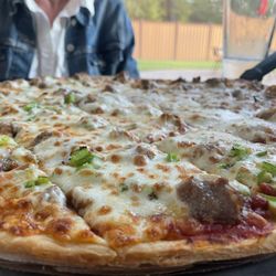 Flame Restaurant - Service, excellent   Pizza, darned good, could not stop eating it due to lotza mozza, rich sauce, and crispy crust.  Go there and eat it up!