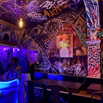Vibe Bar Maui - a woman standing at the bar - Lounges Near Me - Kihei, Hawaii