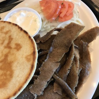 Nicky's Red Hots - Gyros platter with one pita, raw onions, tomato, and tatziki sauce. - Greek Near Me - Naperville, Illinois Nicky's Red Hots - Gyros platter with one pita, raw onions, tomato, and tatziki sauce. - Greek Near Me - Naperville, Illinois