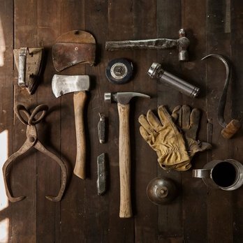 Dr.House CT Contractor -  tools laid out on a wooden floor - General Contractors Near Me