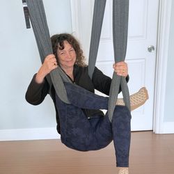 Radiant Strength - Deep hip stretch with spinal traction on yoga suspension swing