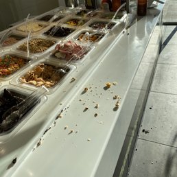 Dirty topping bar, no people inside the store when I saw this.