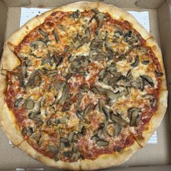 Papa Giovanni La Pizza Siciliana - Mushroom Pizza well done $16.95. Crust wasn't good. Mushrooms were delicious.
