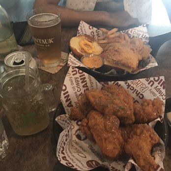 Pelicana Chicken - Flushing - $36 for 8 pieces of honey garlic crispy wings, chicken burger & fries, and a beer - Korean Near Me - Flushing, New York Pelicana Chicken - Flushing - $36 for 8 pieces of honey garlic crispy wings, chicken burger & fries, and a beer - Korean Near Me - Flushing, New York