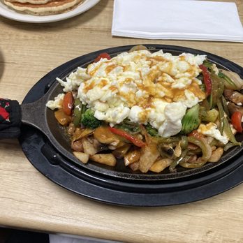 Arnie’s Cafe - This is the veggie skillet. It came actually sizzling to the table, which was kind of cool. - Breakfast & Brunch Near Me - Reno, Nevada