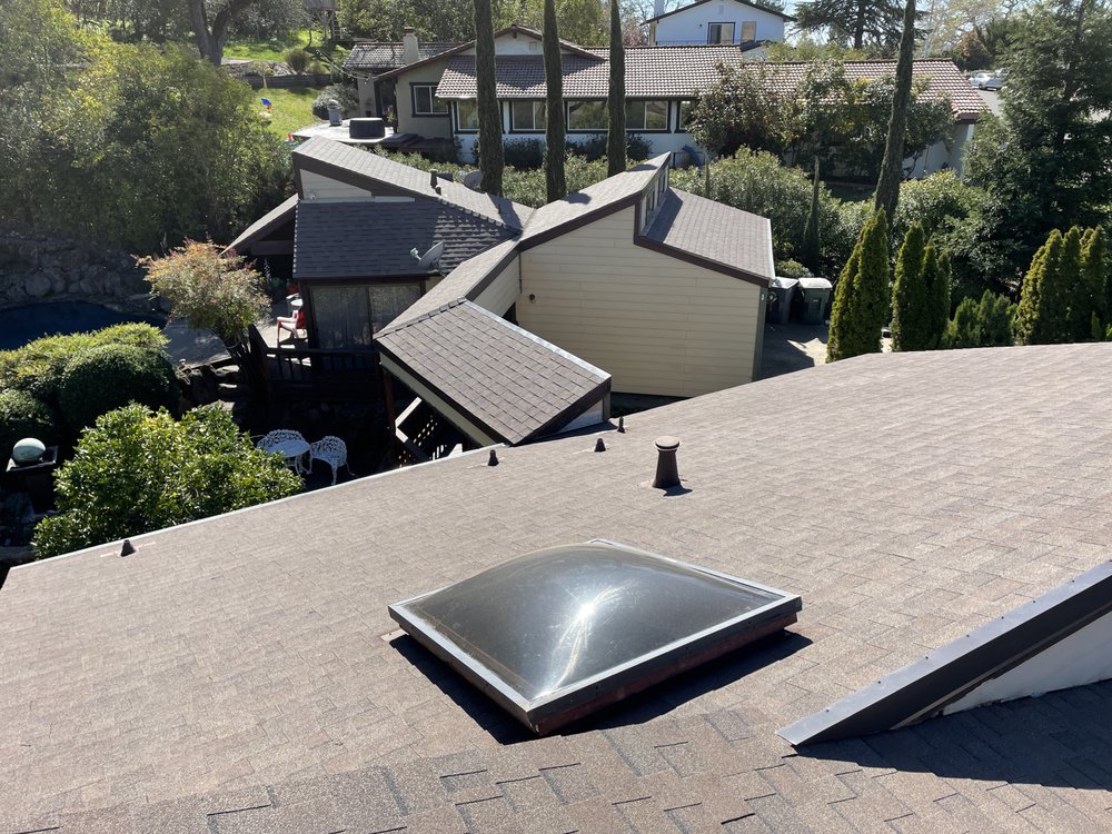 Slide of Triark Roofing