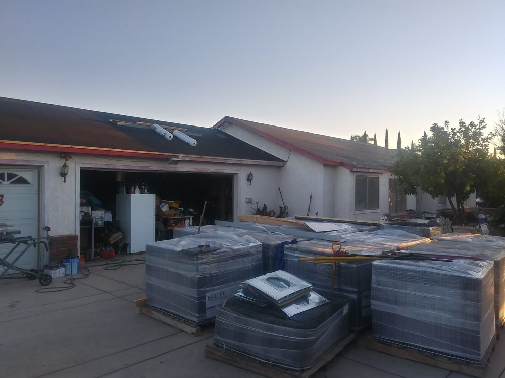 Slide of Ortiz Roofing and Construction Company