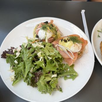 Poached Kitchen - Salmon egg Benedict with salad. - Breakfast & Brunch Near Me - Irvine, California Poached Kitchen - Salmon egg Benedict with salad. - Breakfast & Brunch Near Me - Irvine, California