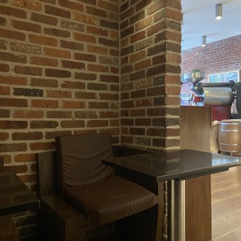 CFCF Coffee - Cute brick seating section - Cafes Near Me - Greenwich, Connecticut