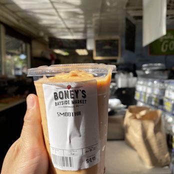 Boney's Bayside Market - a hand holding a cup of coffee - Grocery Near Me - Coronado, California