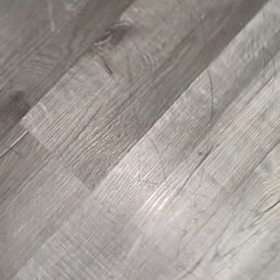 These scratches covered the whole floor in the room These scratches covered the whole floor in the room