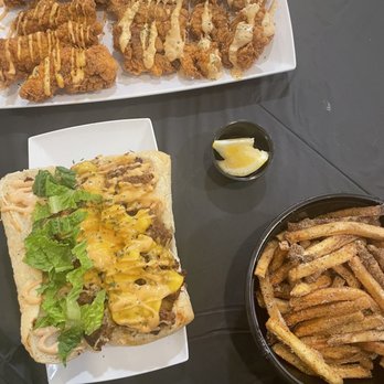 PoBoyz - Ultimate Fried Feast Best Of Both Worlds PoBoy W/ Fresh Cut Fries Fresh Cut Fries - Seafood Near Me - Chicago, Illinois