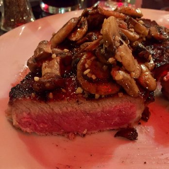 Little Bear Inn - Brandy ribeye steak served rare-plus (just how I like it) - Steakhouses Near Me - Cheyenne, Wyoming