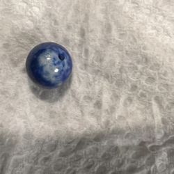 Bead Source - Fake lapis lazuli bead after the color came off exposing the white (glass?) bead underneath.
