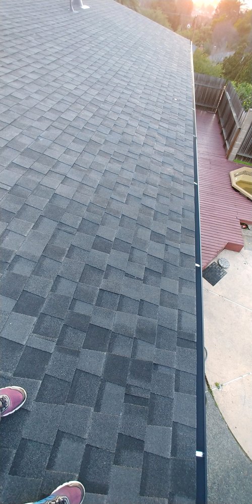 Slide of T D Roofing