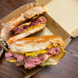 McDonald's - My cousin got a quarter pounder with cheese burger from Mcdonald's today and it was pink and bloody in the middle