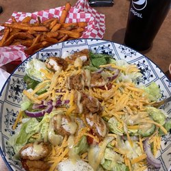 Bucky's Sit or Get - Had the crispy chicken salad and sweet potatoes fries. Salad was massive and delicious! Sweet potato fries were cooked perfect.