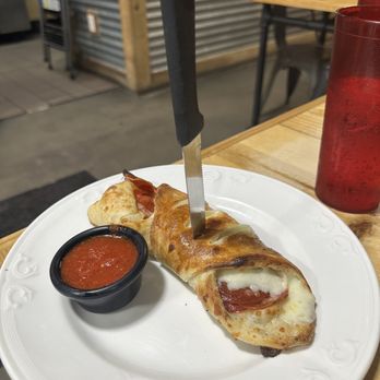 Muzzarella Pizza & Italian Kitchen - Pepperoni Stromboli - Pizza Near Me - Orlando, Florida Muzzarella Pizza & Italian Kitchen - Pepperoni Stromboli - Pizza Near Me - Orlando, Florida