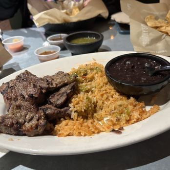 Sharky's Woodfired Mexican Grill - 1/2 All Natural Angus Steak Plate. Meat was tender and juicy. The rice was okay just a little undercooked. - Mexican Near Me - Studio City, California Sharky's Woodfired Mexican Grill - 1/2 All Natural Angus Steak Plate. Meat was tender and juicy. The rice was okay just a little undercooked. - Mexican Near Me - Studio City, California