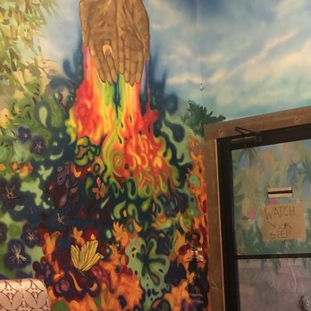 Indika House - a mural of an angel on the wall - Indian Near Me - Brooklyn, New York Indika House - a mural of an angel on the wall - Indian Near Me - Brooklyn, New York