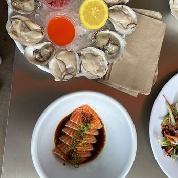 POST Houston - Oysters and salmon carpaccio - Music Venues Near Me - Houston, Texas