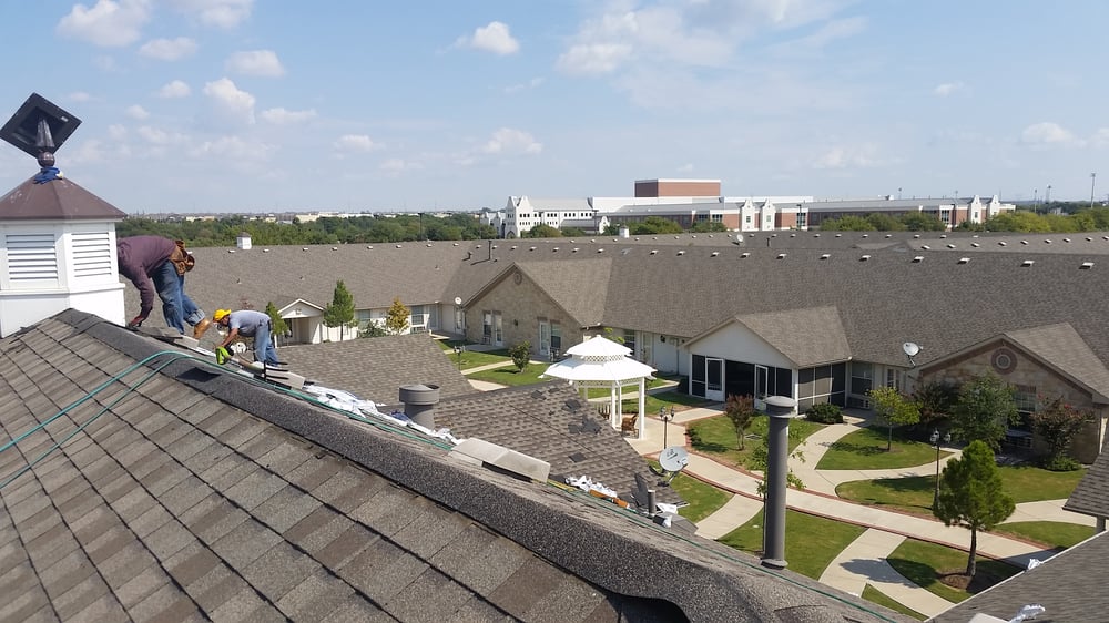 Slide of Einstein Roofing and Restoration