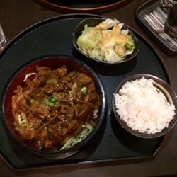 Miyako - Pork Teriyaki plate, comes with pork over a bed of cabbage, (very good!), and a bowl of white rice in addition to a small side salad.